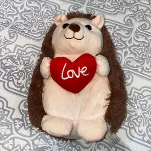 Hedgehog stuffed toy with heart